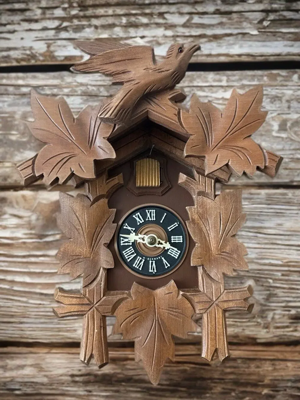 Wood Black Forest Cuckoo Clock Brown Analog Roman Numerals Bird Leaf Design